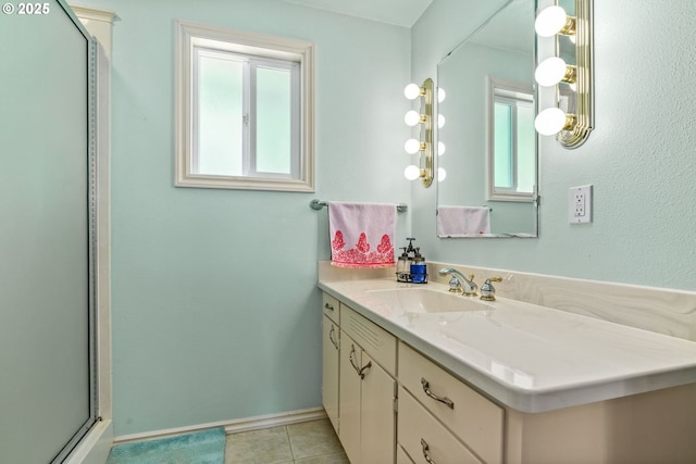 38383 Cartwright Creek Rd, Marcola, OR 97454 - full bath featuring vanity, baseboards, tile patterned flooring, and a shower with shower door