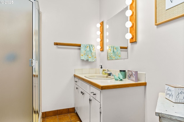 38383 Cartwright Creek Rd, Marcola, OR 97454 - full bath with vanity, a stall shower, tile patterned floors, and baseboards