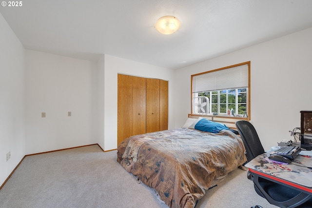 9065 Trask River Rd, Tillamook, OR 97141 - bedroom featuring light carpet, a closet, and a desk