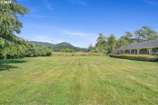 9065 Trask River Rd, Tillamook, OR 97141 - view of green lawn with a mountain view