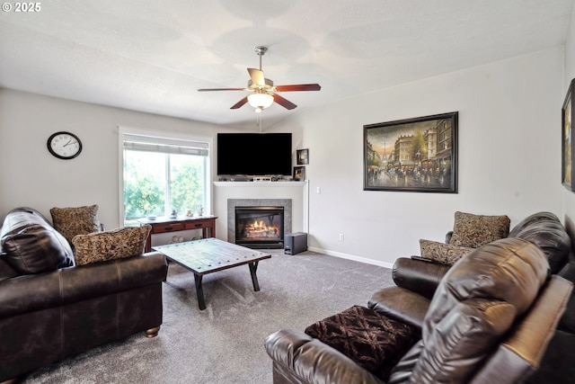 114 10th St, Jefferson, OR 97352 - living room featuring a tile fireplace, ceiling fan, carpet flooring, and baseboards