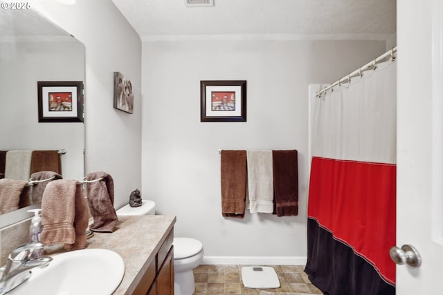 114 10th St, Jefferson, OR 97352 - bathroom featuring toilet, vanity, baseboards, and a shower with shower curtain