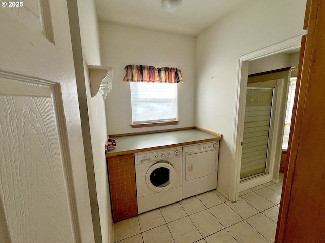 9949 Geneva View Rd, Terrebonne, OR 97760 - clothes washing area with separate washer and dryer and light tile patterned floors