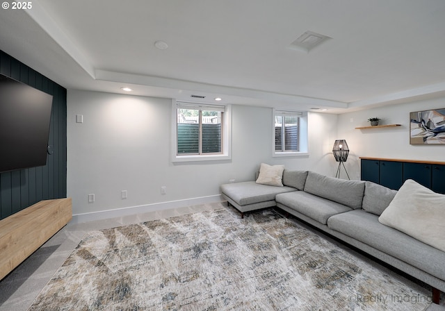 10262 SE 99th Dr, Happy Valley, OR 97086 - carpeted living room with recessed lighting, a raised ceiling, and wooden walls