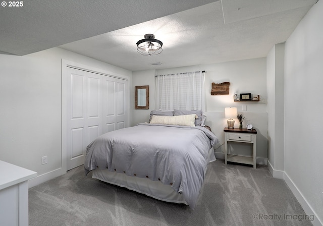 10262 SE 99th Dr, Happy Valley, OR 97086 - bedroom featuring carpet, a closet, baseboards, and a textured ceiling