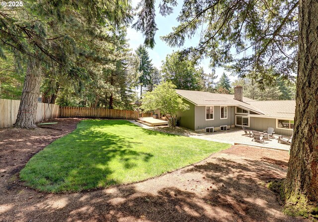 10262 SE 99th Dr, Happy Valley, OR 97086 - view of yard with a deck and a patio