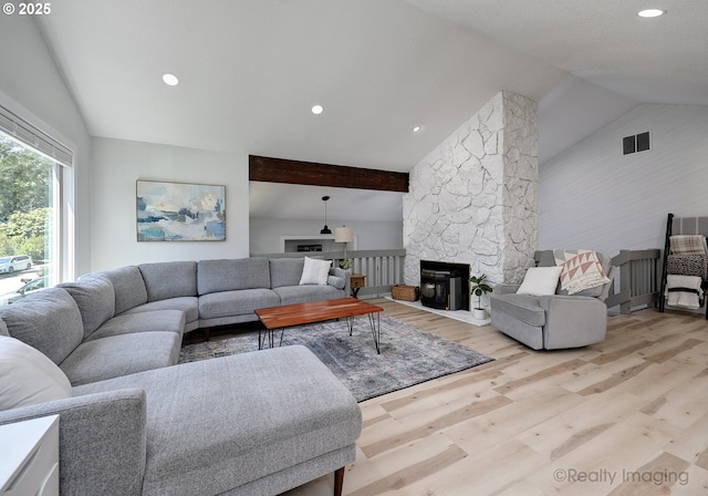 10262 SE 99th Dr, Happy Valley, OR 97086 - living room featuring wood finished floors, a stone fireplace, and recessed lighting
