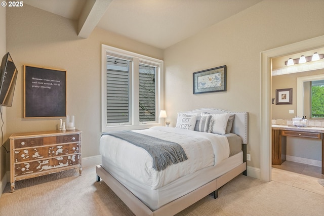 4640 SE Honors Dr, Gresham, OR 97080 - bedroom with ensuite bathroom, baseboards, light colored carpet, and beam ceiling