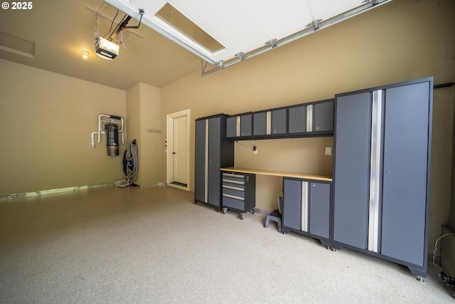 4640 SE Honors Dr, Gresham, OR 97080 - garage featuring a central vacuum unit and a garage door opener
