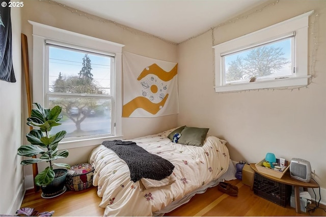 bedroom featuring hardwood / wood-style floors