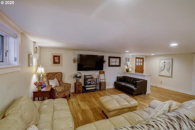 living room with light hardwood / wood-style floors