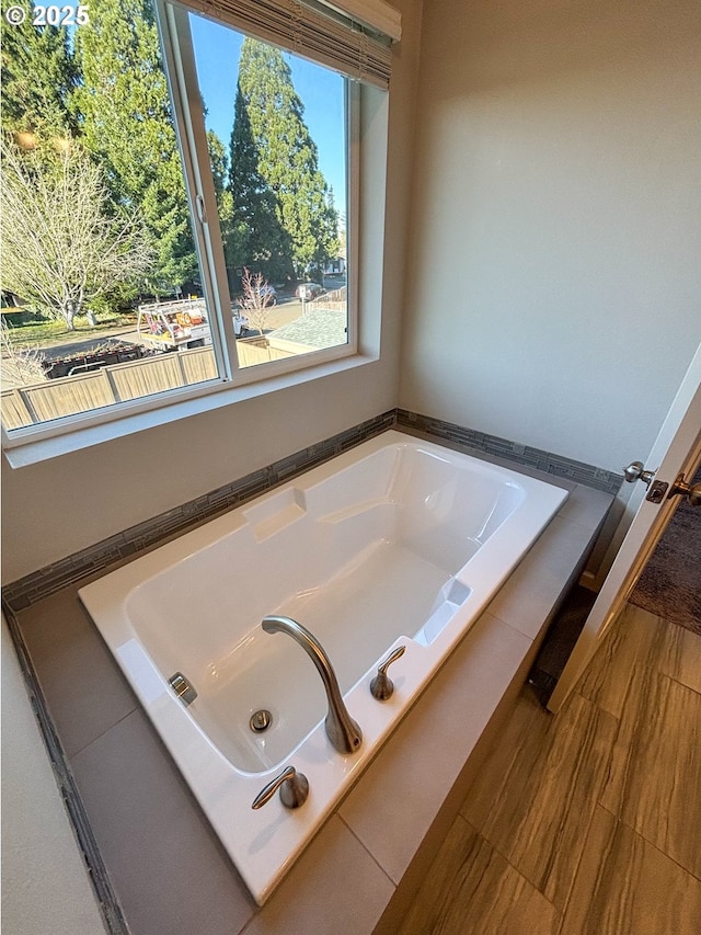 bathroom with a washtub