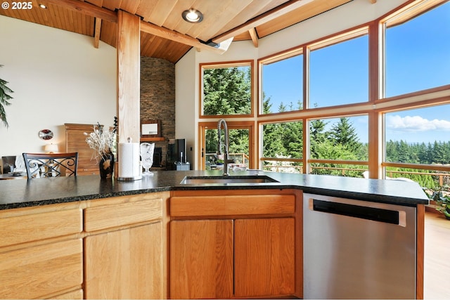 38617 SE Nichols Hill Rd, Washougal, WA 98671 - kitchen with stainless steel dishwasher, high vaulted ceiling, a wood ceiling with exposed beams, and dark stone counters