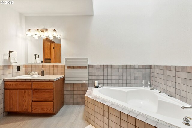 38617 SE Nichols Hill Rd, Washougal, WA 98671 - bathroom with vanity, a garden tub, and tile patterned floors