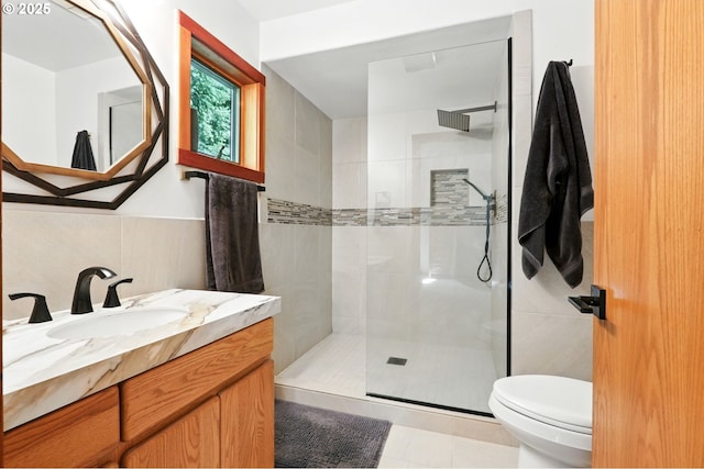38617 SE Nichols Hill Rd, Washougal, WA 98671 - full bath featuring a tile shower, vanity, and tile walls