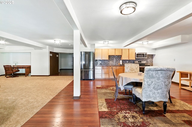 38617 SE Nichols Hill Rd, Washougal, WA 98671 - dining area featuring baseboards and dark wood-style flooring