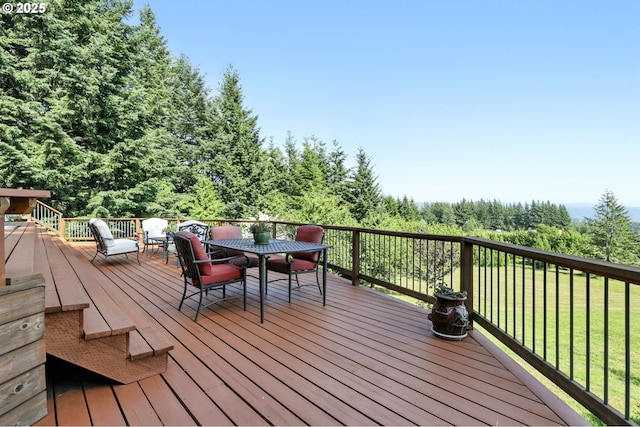 38617 SE Nichols Hill Rd, Washougal, WA 98671 - wooden deck with outdoor dining space and a lawn