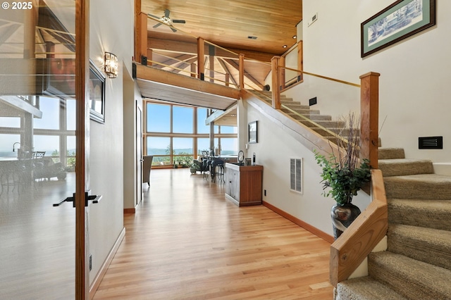 38617 SE Nichols Hill Rd, Washougal, WA 98671 - foyer with a towering ceiling, light wood-type flooring, stairs, and ceiling fan