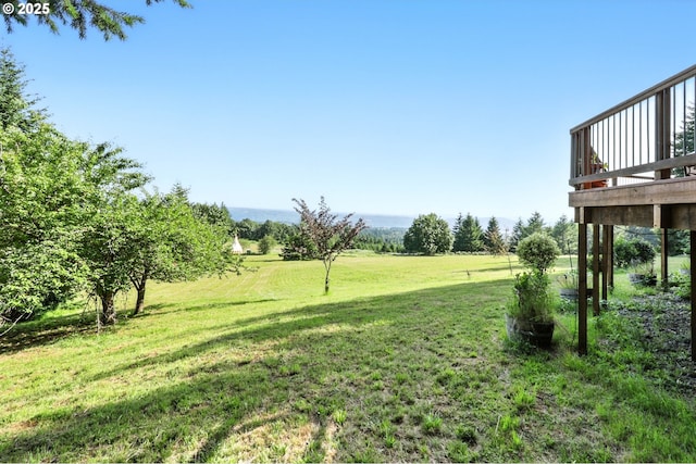 38617 SE Nichols Hill Rd, Washougal, WA 98671 - view of green lawn with a deck and a rural view