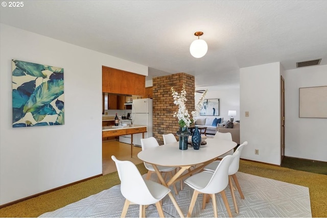 861 Dietz Ave NE, Keizer, OR 97303 - dining room featuring carpet flooring and baseboards