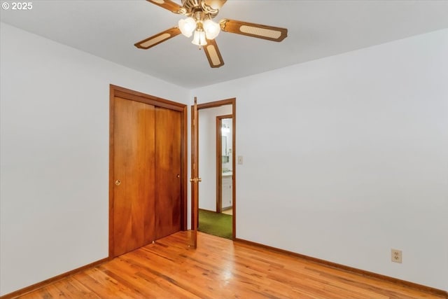 861 Dietz Ave NE, Keizer, OR 97303 - unfurnished bedroom with light wood finished floors, a closet, and a ceiling fan