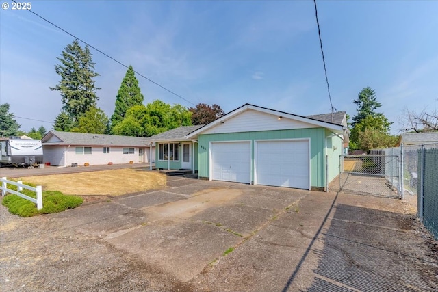 861 Dietz Ave NE, Keizer, OR 97303 - ranch-style home featuring a garage, driveway, and a gate