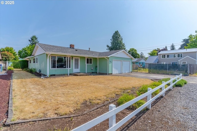 861 Dietz Ave NE, Keizer, OR 97303 - single story home featuring an attached garage, asphalt driveway, and a chimney