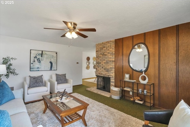 861 Dietz Ave NE, Keizer, OR 97303 - carpeted living room featuring a ceiling fan and a fireplace