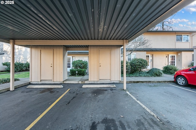 view of parking with a carport