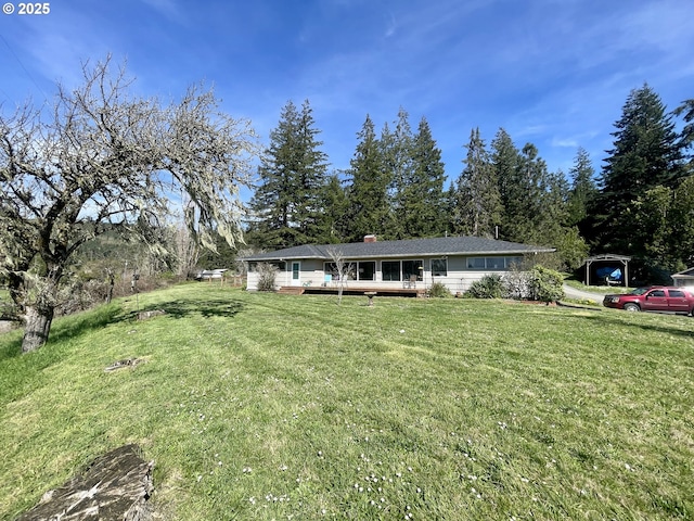 54824 Robinson Rd, Coquille, OR 97423 - ranch-style home with a deck, a front yard, and a chimney