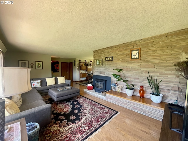 54824 Robinson Rd, Coquille, OR 97423 - living room featuring a textured ceiling and wood finished floors