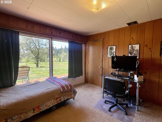54824 Robinson Rd, Coquille, OR 97423 - bedroom with carpet, multiple windows, wood walls, and a desk