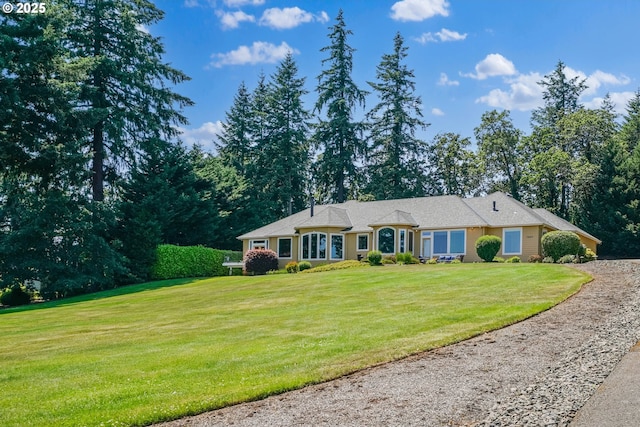7947 Lavender Ln, Turner, OR 97392 - ranch-style house featuring a front lawn and driveway