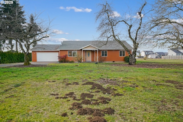 ranch-style home featuring a garage and a front yard