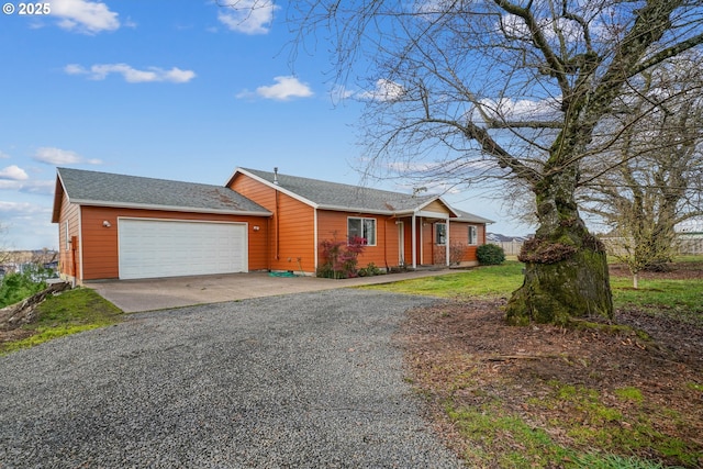 ranch-style home with a garage