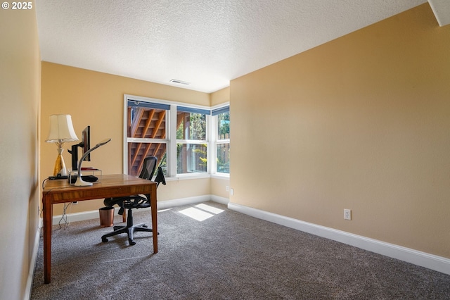 80 Sweden Cir, Silverton, OR 97381 - carpeted office featuring a textured ceiling and baseboards