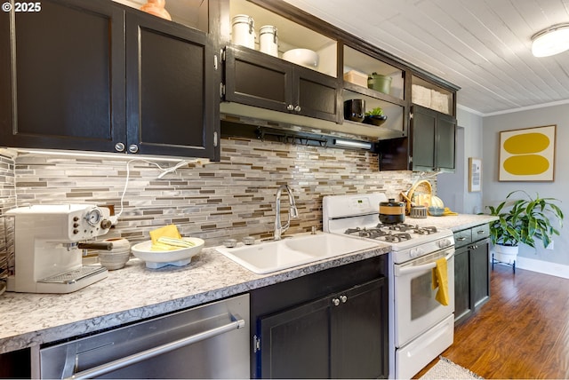 kitchen with sink, crown molding, dishwasher, tasteful backsplash, and white gas range