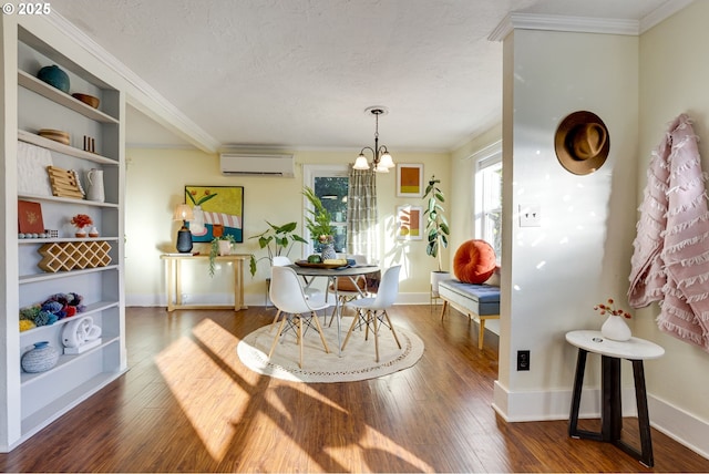 dining room featuring crown molding, a wall mounted air conditioner, hardwood / wood-style flooring, and a textured ceiling