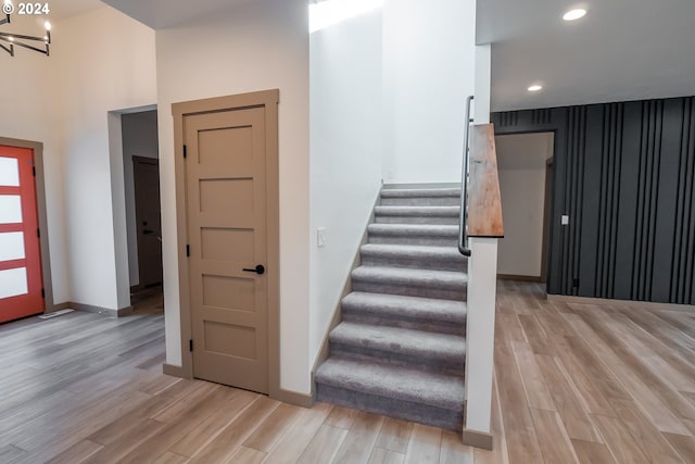 staircase featuring hardwood / wood-style flooring