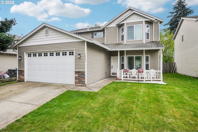 12711 NE 49th Way, Vancouver, WA 98682 - view of front of property with a porch, an attached garage, concrete driveway, a front lawn, and stone siding