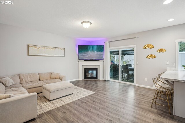 12711 NE 49th Way, Vancouver, WA 98682 - living room featuring stairway, wood finished floors, baseboards, and recessed lighting