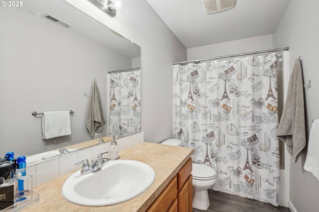 12711 NE 49th Way, Vancouver, WA 98682 - kitchen with appliances with stainless steel finishes, a sink, a peninsula, light countertops, and a kitchen breakfast bar