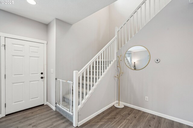 12711 NE 49th Way, Vancouver, WA 98682 - entryway with wood finished floors, baseboards, and stairway