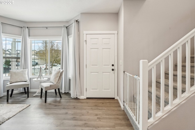12711 NE 49th Way, Vancouver, WA 98682 - entrance foyer with wood finished floors, a chandelier, baseboards, recessed lighting, and stairs