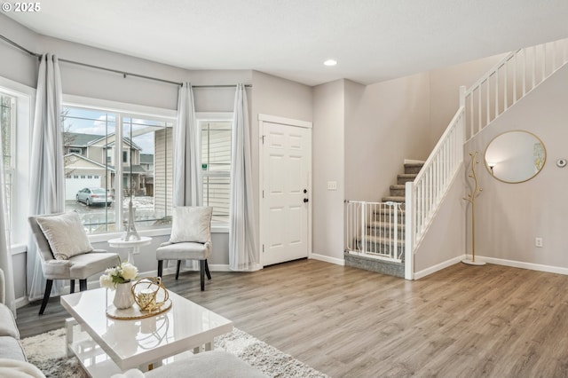 12711 NE 49th Way, Vancouver, WA 98682 - living area featuring stairs, wood finished floors, baseboards, and recessed lighting