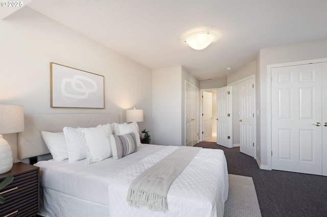 2452 NW Pettygrove St, Portland, OR 97210 - bedroom with baseboards and dark carpet