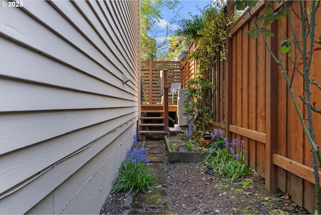 2452 NW Pettygrove St, Portland, OR 97210 - view of home's exterior with a wooden deck and fence