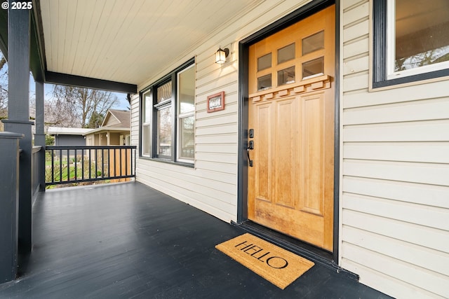 property entrance featuring covered porch