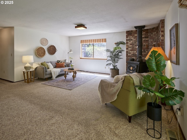 135 Ridgecrest Dr, Toledo, WA 98591 - living area with carpet floors, a wood stove, and a textured ceiling