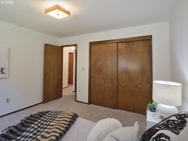 135 Ridgecrest Dr, Toledo, WA 98591 - bedroom featuring light colored carpet, a closet, and baseboards